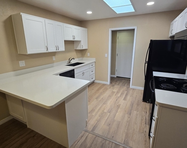 5128 W Surrey Avenue - Photo Thumbnail 1