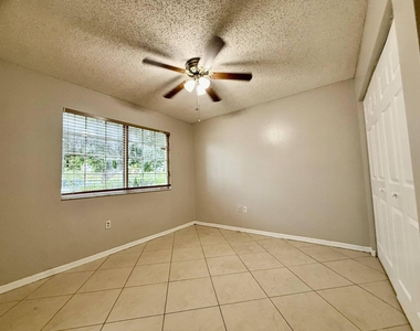 5065 Wiles Road - Photo Thumbnail 5