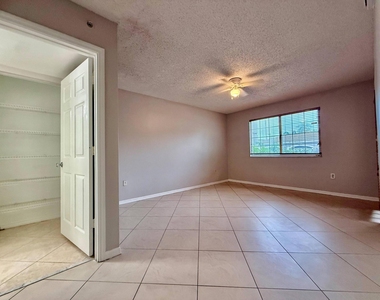 5065 Wiles Road - Photo Thumbnail 4