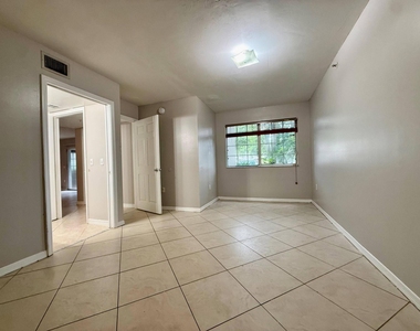 5065 Wiles Road - Photo Thumbnail 12