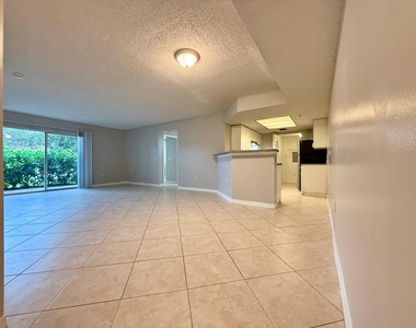 5065 Wiles Road - Photo Thumbnail 2