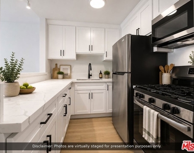 1337 S Hoover Street - Photo Thumbnail 3