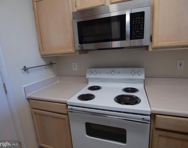 1591 Spring Gate Drive - Photo Thumbnail 4