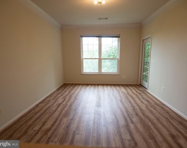 1591 Spring Gate Drive - Photo Thumbnail 2