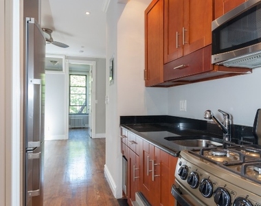 Mott St., Unit 14 - Photo Thumbnail 1