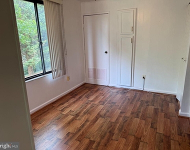 8709 Hayshed Lane - Photo Thumbnail 4