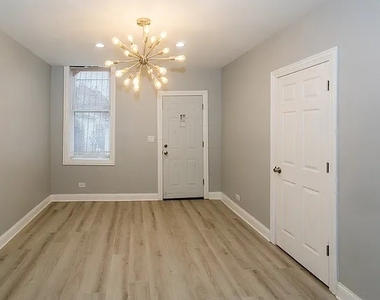 834 N Mozart Street - Photo Thumbnail 1