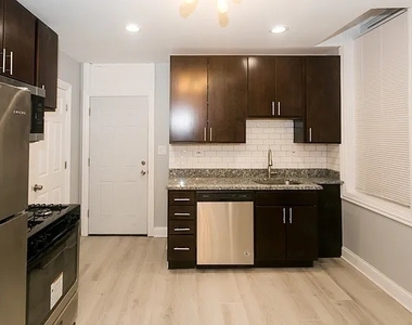 834 N Mozart Street - Photo Thumbnail 3