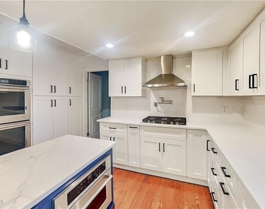 4623 Huntridge Drive Ne - Photo Thumbnail 3