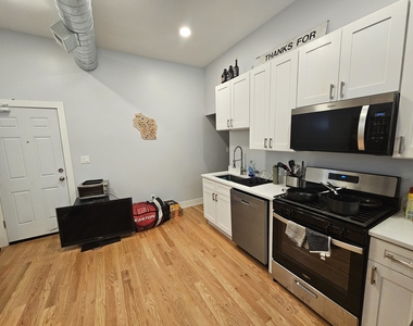 1415 W Erie Street - Photo Thumbnail 3