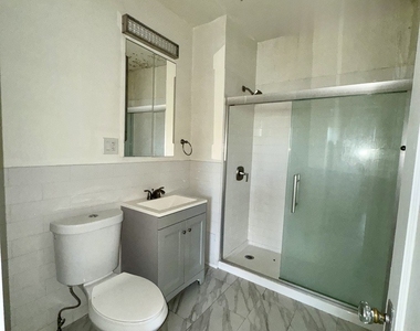 2345 Cuyler Avenue - Photo Thumbnail 8
