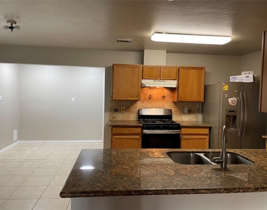 9311 Parkmore Drive Drive - Photo Thumbnail 1