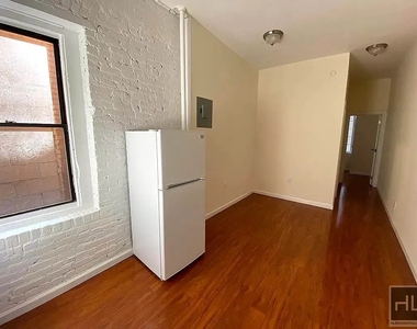 E 3rd St - Photo Thumbnail 2