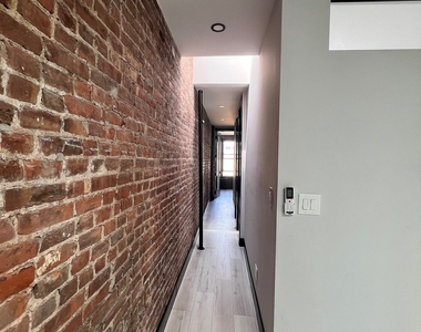 W 52nd St. - Photo Thumbnail 1