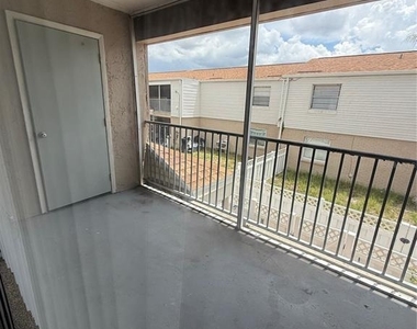 7210 N Manhattan Avenue - Photo Thumbnail 4