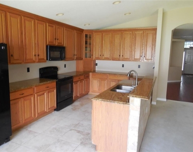 15447 Osprey Glen Drive - Photo Thumbnail 4