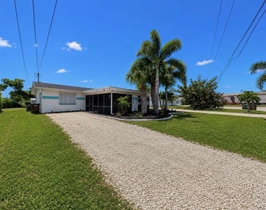 4931 Victoria Drive - Photo Thumbnail 2