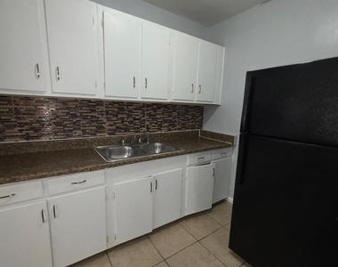 1816 E 27th Street - Photo Thumbnail 3