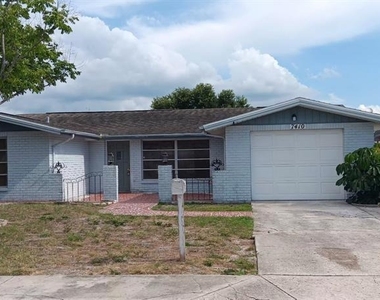 7410 Moravian Drive - Photo Thumbnail 1