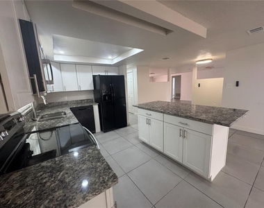 7410 Moravian Drive - Photo Thumbnail 2