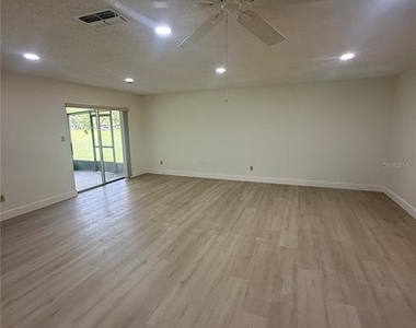 10719 Lazy Lake Drive - Photo Thumbnail 4
