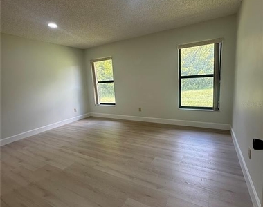 10719 Lazy Lake Drive - Photo Thumbnail 10