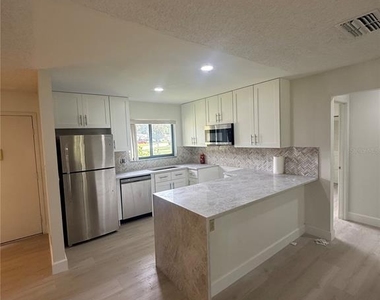10719 Lazy Lake Drive - Photo Thumbnail 2