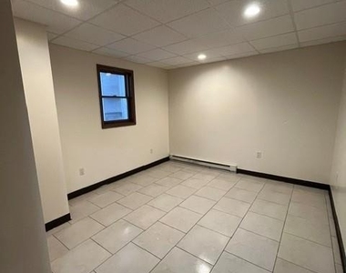 233 E Ridge Street - Photo Thumbnail 5