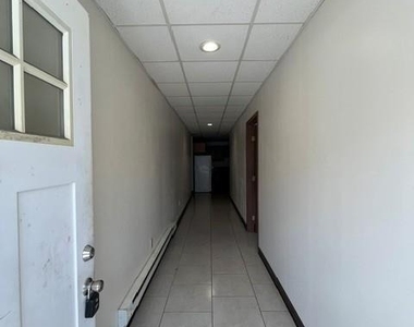 233 E Ridge Street - Photo Thumbnail 3