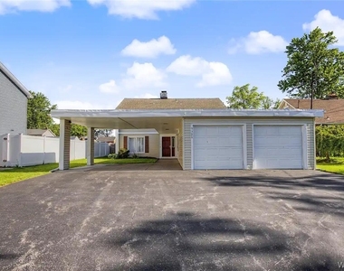9326 Rivershore Drive - Photo Thumbnail 2