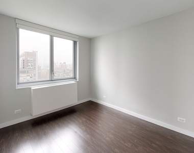401 E 34th St - Photo Thumbnail 3