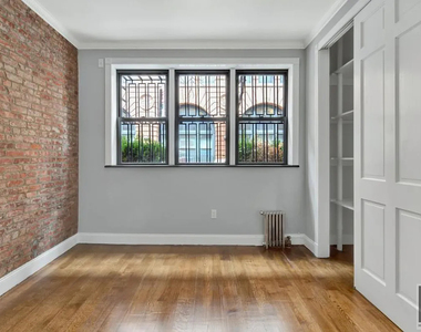 E 26th St. - Photo Thumbnail 3
