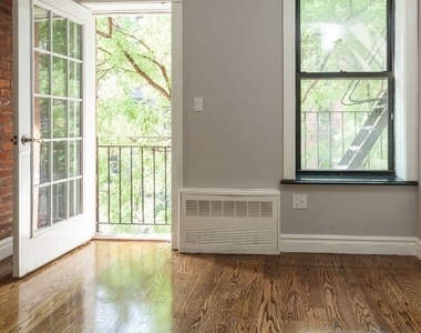 East 5 Street - Photo Thumbnail 3