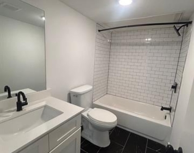 321 E 8th Street - Photo Thumbnail 3