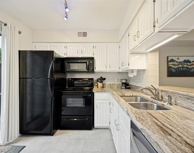 5626 Preston Oaks Road - Photo Thumbnail 3
