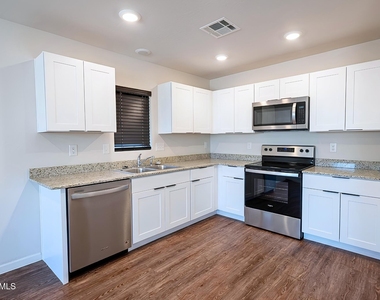 11094 W Arvada Drive - Photo Thumbnail 3