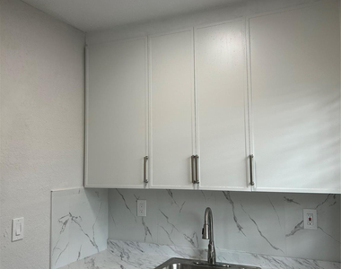 731 Nw 56th Street - Photo Thumbnail 2