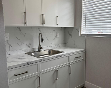 731 Nw 56th Street - Photo Thumbnail 1