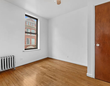 East 115th Street - Photo Thumbnail 1