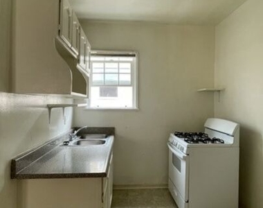 1159 S Westmoreland Avenue - Photo Thumbnail 5