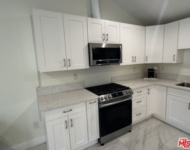 1913 Hillsboro Avenue - Photo Thumbnail 2