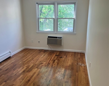 240-53 68th Avenue - Photo Thumbnail 8