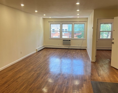 240-53 68th Avenue - Photo Thumbnail 2