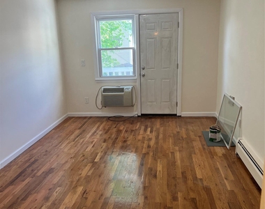 240-53 68th Avenue - Photo Thumbnail 5