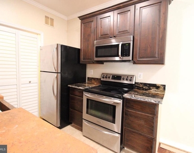 1570 Spring Gate Drive - Photo Thumbnail 8