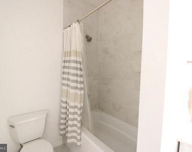 1570 Spring Gate Drive - Photo Thumbnail 4