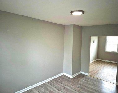929 E 41st Street - Photo Thumbnail 4
