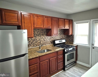 929 E 41st Street - Photo Thumbnail 2