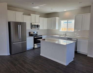 9717 Grapevine Leaf Dr - Photo Thumbnail 3