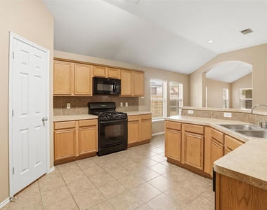 9618 Red Rugosa Drive - Photo Thumbnail 5